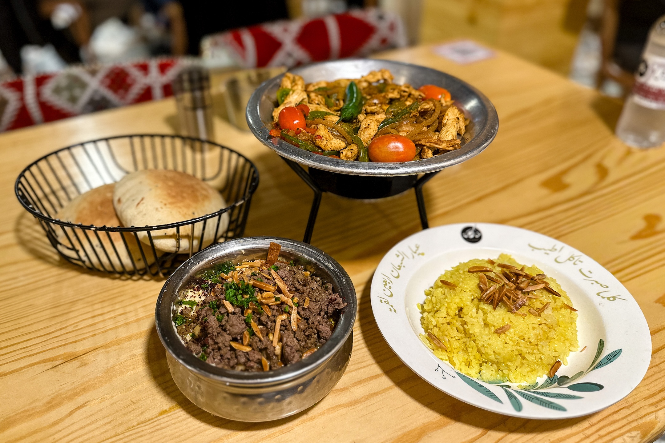 A spread of Khashoka dishes — mezze, salads, and shared plates